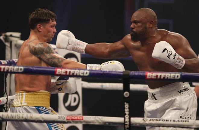 Chisora put the pressure on Usyk in the early stages Photo Credit: Mark Robinson/Matchroom Boxing