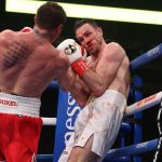 Smith battled to the final bell despite a punishing Canelo display Photo Credit: Ed Mulholland/Matchroom Boxing