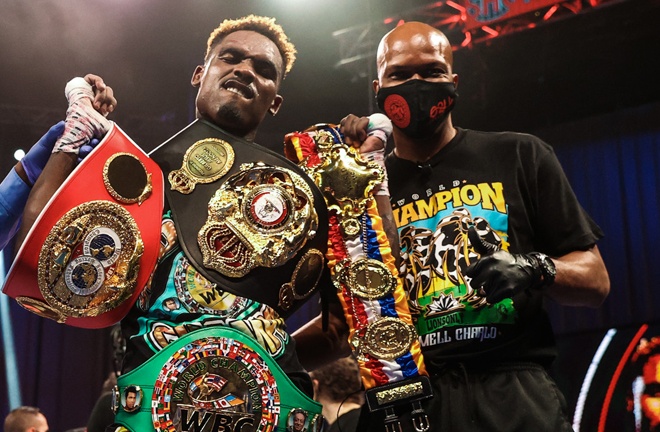 Jermell Charlo hold three of the four world title belts Photo Credit: Amanda Westcott