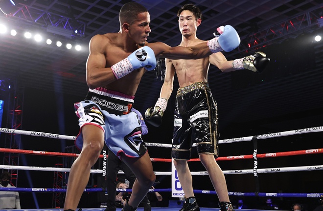 Masayoshi Nakatani climbed off the canvas to halt Felix Verdejo Photo Credit: Mikey Williams/Top Rank via Getty Images