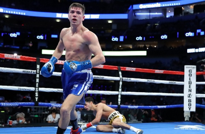 Campbell floored Garcia with a flush left hook in the second round Photo Credit: Tom Hogan-Hogan Photos/Golden Boy