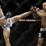 McGregor rematches Dustin Poirier at UFC 257 on January 24 Photo Credit: John Locher/Associated Press