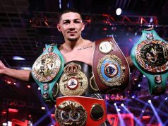Teofimo Lopez holds the WBA 'Super', IBF, WBO and WBC Franchise belts Photo Credit: Mikey Williams/Top Rank