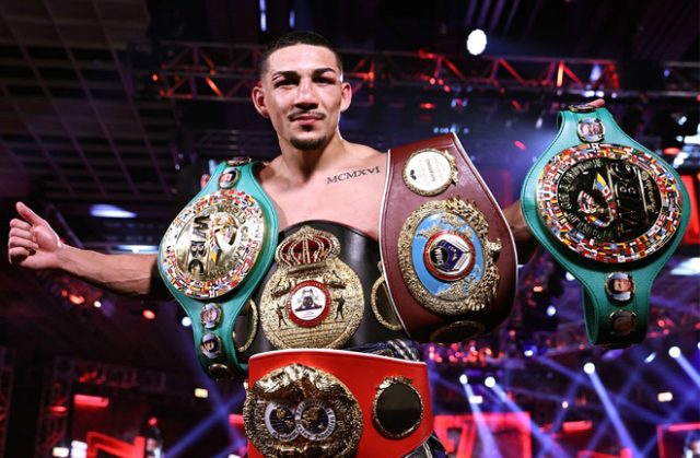 Teofimo Lopez holds the WBA 'Super', IBF, WBO and WBC Franchise belts Photo Credit: Mikey Williams/Top Rank