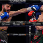 It was a fiercely-contested battle between Ahmed and Khademi Photo Credit: Round ‘N’ Bout Media/Queensberry Promotions