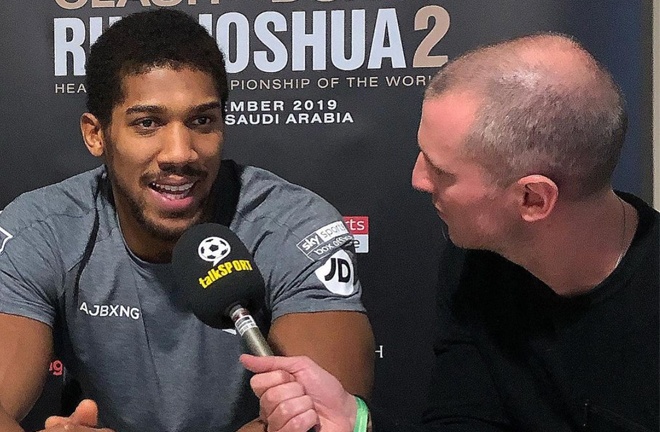 Catterall interviewing unified Heavyweight world champion, Anthony Joshua for talkSPORT Photo Credit: Instagram @adamcatterall