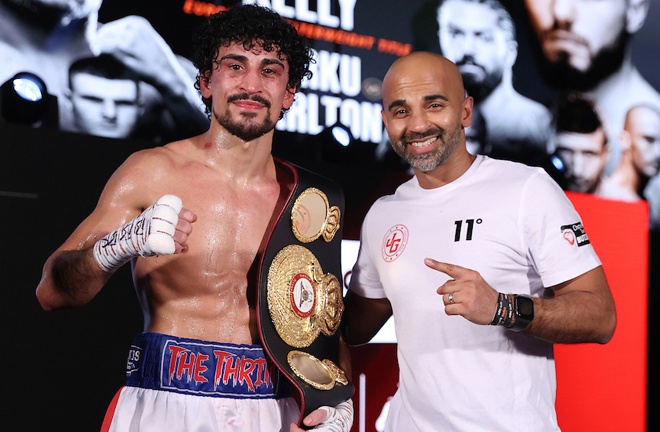 Gill celebrates with trainer Dave Coldwell Photo Credit: Mark Robinson/Matchroom Boxing