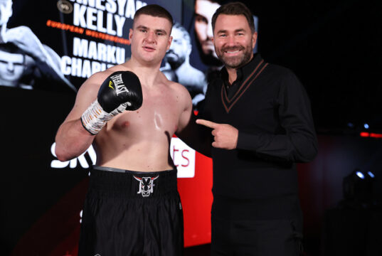 Johnny Fisher celebrates alongside promoter Eddie Hearn after securing a first professional win on Saturday Photo Credit: Mark Robinson/Matchroom Boxing