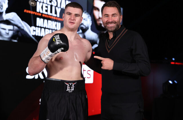 Johnny Fisher celebrates alongside promoter Eddie Hearn after securing a first professional win on Saturday Photo Credit: Mark Robinson/Matchroom Boxing