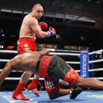 Zhang knocked down Forrest in each of the opening three rounds Photo Credit: Ed Mulholland/Matchroom