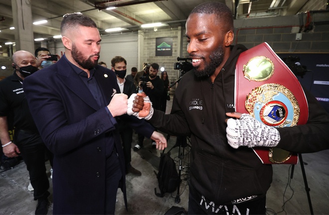 Okolie embraced with former WBC cruiserweight champion, Tony Bellew after becoming world champion Photo Credit: Mark Robinson/Matchroom Boxing