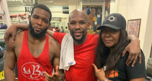Denis Douglin alongside Floyd Mayweather Jr and his mum and trainer after a 2am sparring session last year Photo Credit: Instagram @mommasboy_denis