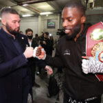 Okolie embraces with former Cruiserweight world champion Tony Bellew Photo Credit: Mark Robinson/Matchroom Boxing