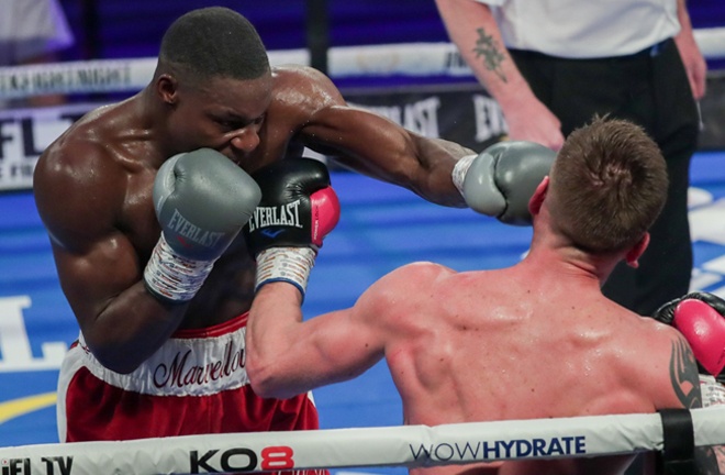 Dan Azeez retained his English Light Heavyweight title with a hard-fought win over Ricky Summers Photo Credit: Scott Rawsthorne/MTK Global