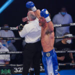 Cash landed a barrage of unanswered right hands on Bentley before referee Victor Loughlin intervened Photo Credit: Round ‘N’ Bout Media/Queensberry Promotions
