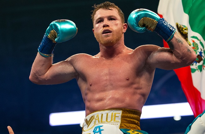 Canelo celebrates his seventh win over a British fighter Photo Credit: Saunders' eye completely closed after a brutal uppercut and he was taken to hospital Photo Credit: Michelle Farsi/Matchroom