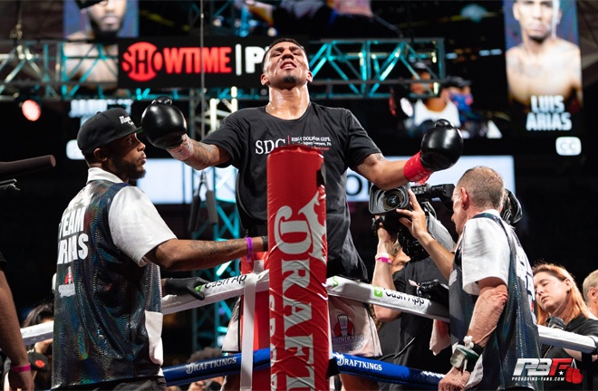 Luis Arias celebrates after defeating Jarrett Hurd Photo Credit: Pro Boxing Fans