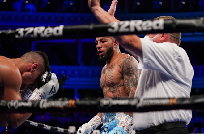 The referee waved off the contest after two Arthur knockdowns and a follow-up attack Photo Credit: Round 'N' Bout Media/Queensberry Promotions