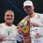 Sheeraz celebrates with new coach Ricky Funez after defending his WBO European Super Welterweight title Photo Credit: Queensberry Promotions