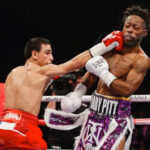Ouballi (left) catching Rau’shee Warren with a right hand. Photo Credit: Showtime Boxing