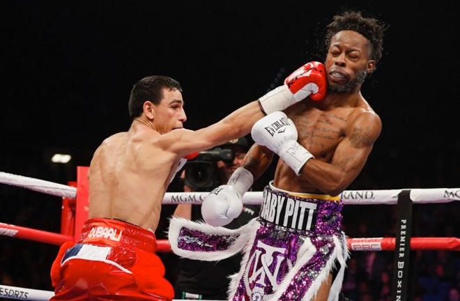 Ouballi (left) catching Rau'shee Warren with a right hand. Photo Credit: Showtime Boxing
