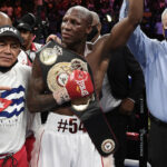 Ugas celebrates with coach Ismael Salas after pulling off the upset Photo Credit: Scott Kirkland/Fox Sports