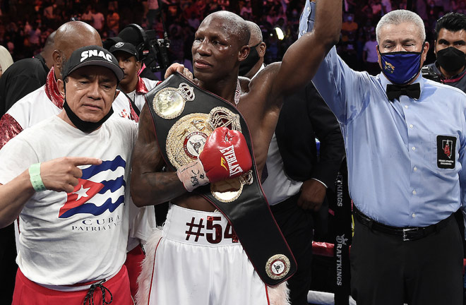 Ugas celebrates with coach Ismael Salas after pulling off the upset Photo Credit: Scott Kirkland/Fox Sports