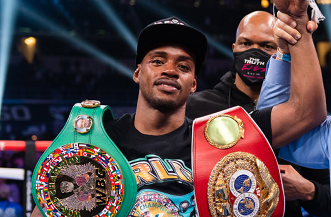 Spence holds the WBC and IBF belts Photo Credit: Ryan Hafey / Premier Boxing Champions