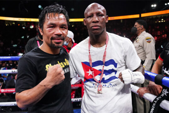Yordenis Ugas and Manny Pacquiao embraced after their fight in Las Vegas on Saturday night Photo Credit: Sean Michael Ham/TGB Promotions
