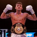 Leigh Wood celebrates after becoming WBA ‘regular’ featherweight world champion Photo Credit: Mark Robinson/Matchroom Boxing