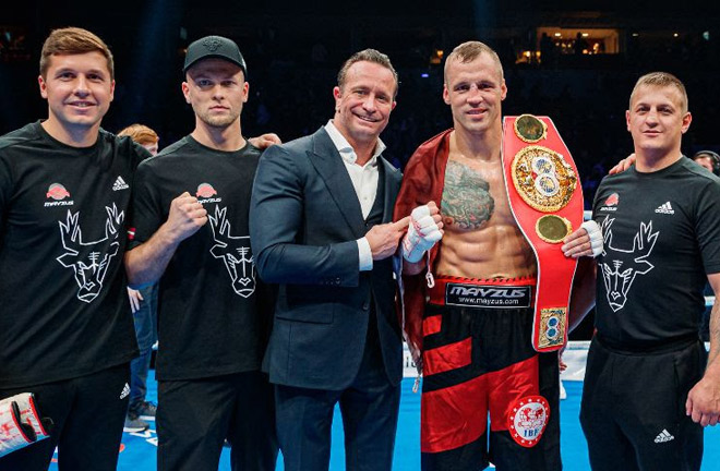 Mairis Briedis celebrates with his team after retaining his IBF cruiserweight world title Photo Credit: Mikus Klavins/ Wasserman Boxing