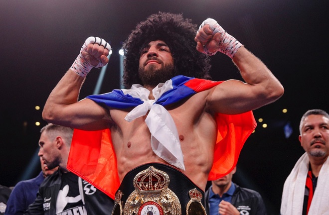 Butaev celebrates after ripping away the WBA 'regular' belt from James Photo Credit: Esther Lin/SHOWTIME