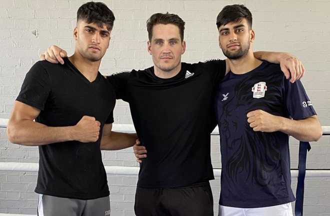 Adam (l) is training alongside brother Hassan (r) who makes his debut on November 20 Photo Credit: Instagram @shanemcguigan