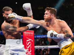 Canelo Alvarez stopped Caleb Plant in the eleventh round to become undisputed super middleweight champion in Las Vegas on Saturday night Photo Credit: Ryan Hafey / Premier Boxing Champions