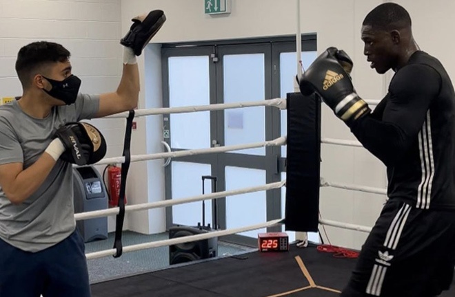 The 20-year-old assists with Richard Riakporhe's training Photo Credit: @hasan.a_1 Instagram