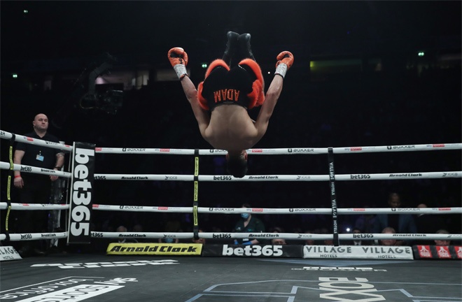 Azim celebrated his victory with a trademark backflip Photo Credit: Lawrence Lustig / BOXXER
