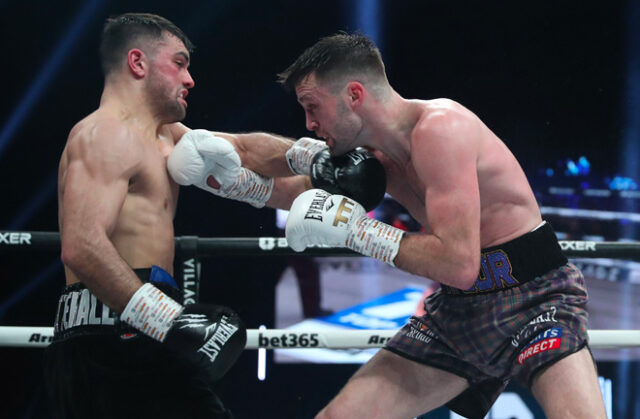 osh Taylor held on to his WBC, WBA (Super), IBF and WBO super lightweight titles with a split decision win against Jack Catterall. Photo Credit: Boxxer