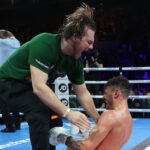Wood celebrates with trainer Ben Davison after his victory Photo Credit: Mark Robinson/Matchroom Boxing