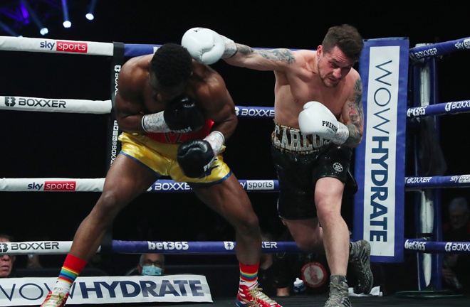 Michael Likalu contest against Carl Turney in the 4th after a Turney suffered a cut to give Likalu a TKO win. Photo Credit: Boxxer.