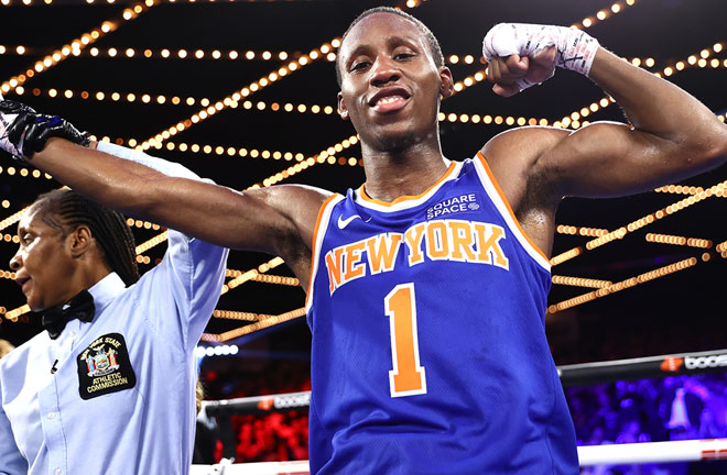 Bruce Carrington celebrates after extending his unbeaten record Photo Credit: Mikey Williams / Top Rank via Getty Images