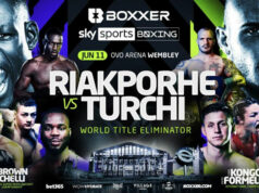 Richard Riakporhe tackles Fabio Turchi in an IBF world cruiserweight title eliminator in Wembley on Saturday Photo Credit: BOXXER