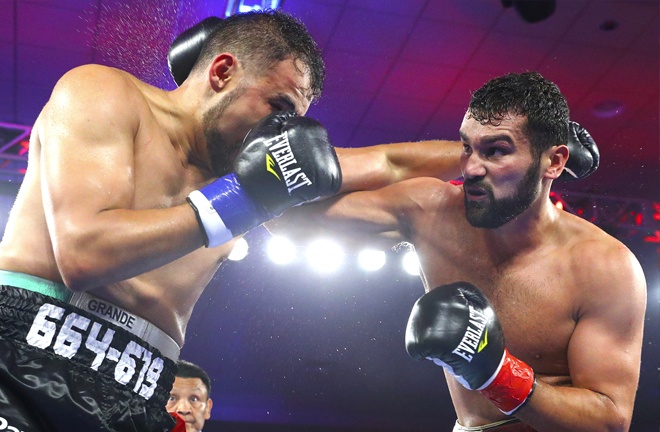Italian Olympian Vianello returned from a nearly 13-month layoff and didn't skip a beat, lacing Rios with combinations until the finish came at the end of round four. Photo Credit: Top Rank Boxing 