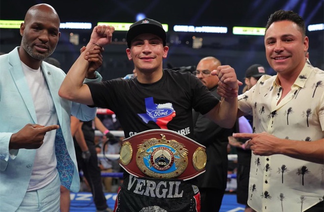 Ortiz Jr alongside his promoters Bernard Hopkins and Oscar De La Hoya after beating McKinson Photo Credit: Golden Boy
