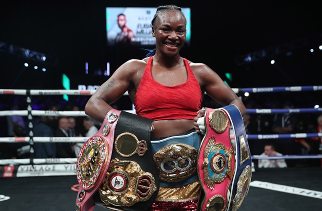 Shields holds the IBF, WBA and WBC belts Photo Credit: Lawrence Lustig / BOXXER 