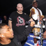 Joshua embraced Whyte after his victory over Franklin in November Photo Credit: Mark Robinson/Matchroom Boxing