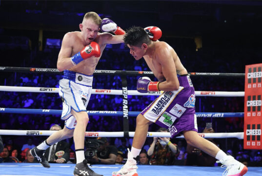 Emanuel “El Vaquero” Navarrete visited the canvas last night, but he got back up to become a three-division world champion against Liam Wilson. Photo Credit: Top Rank Boxing.
