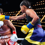 defeats a previously unbeaten Avril Mathie on points to move one step closer to a world title shot. Photo Credit: Matchroom Boxing
