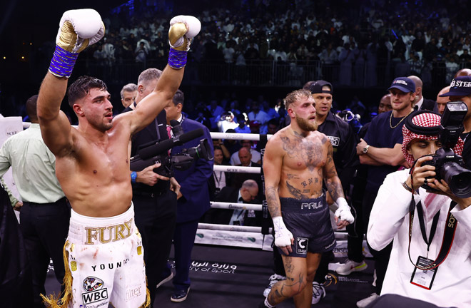 Flores pictured directly behind Paul following his split decision loss to Fury last month Photo Credit: Skill Challenge Entertainment