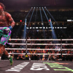 Davis celebrates victory after Garcia is unable to beat the referee’s 10 count Photo Credit: Esther Lin/SHOWTIME