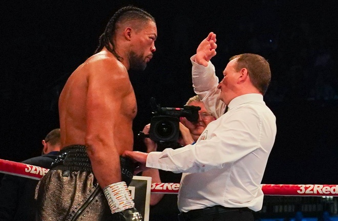 Referee Howard Foster waved off the fight in the sixth round to hand Zhang a shock win over Joyce Photo Credit: Queensberry Promotions